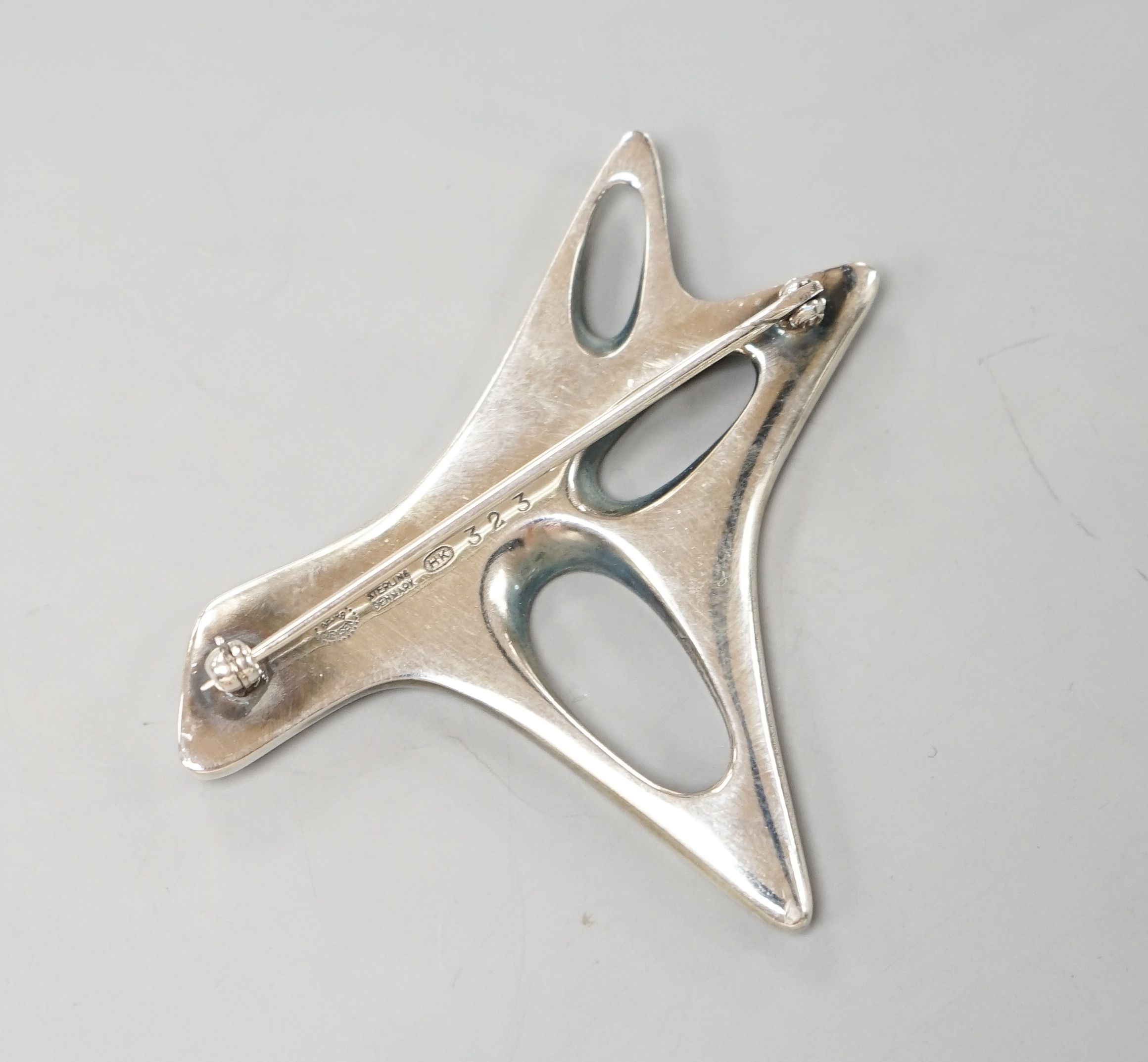A Henning Koppel Georg Jensen sterling and green enamel abstract brooch, no. 323, 57mm.